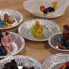 People formed from modeling chocolate and painted with food coloring