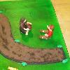 Two children playing with a ball