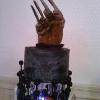 Hand with glove and blades